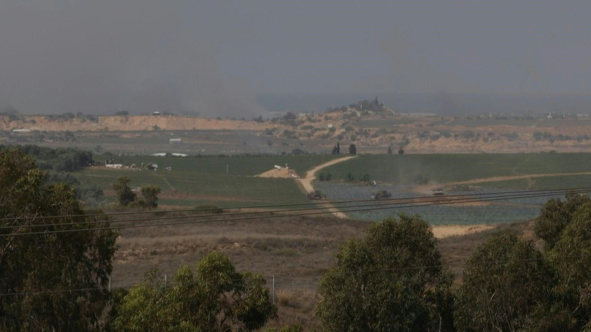 Israeli military bulldozers and a tank roll into northern Gaza