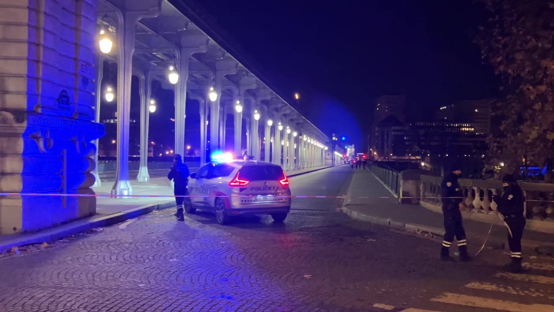 Police officers stand guard near site of Paris knife attack