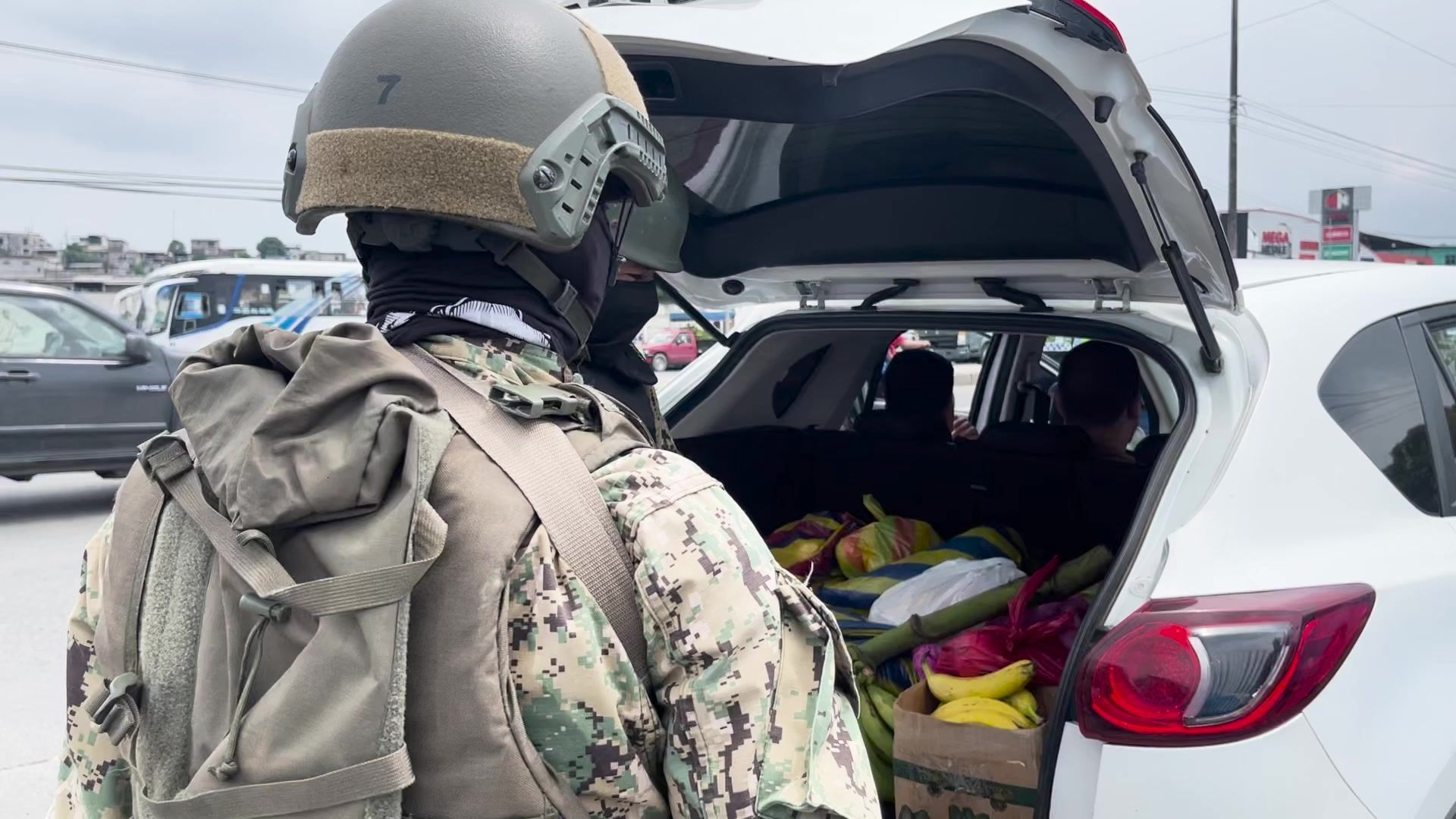 Police and military check vehicles as Ecuador declares war on drug cartels