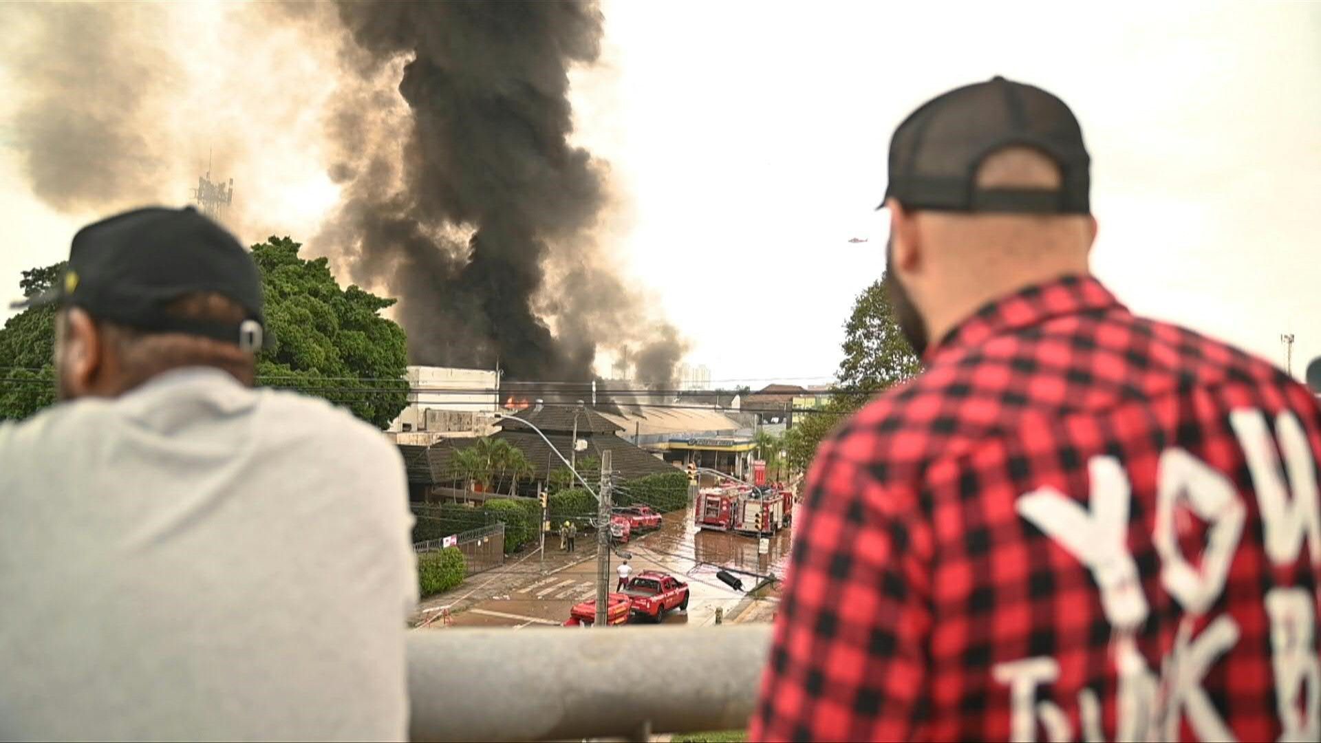 At least two dead after a gas station explodes in flooded Brazil city