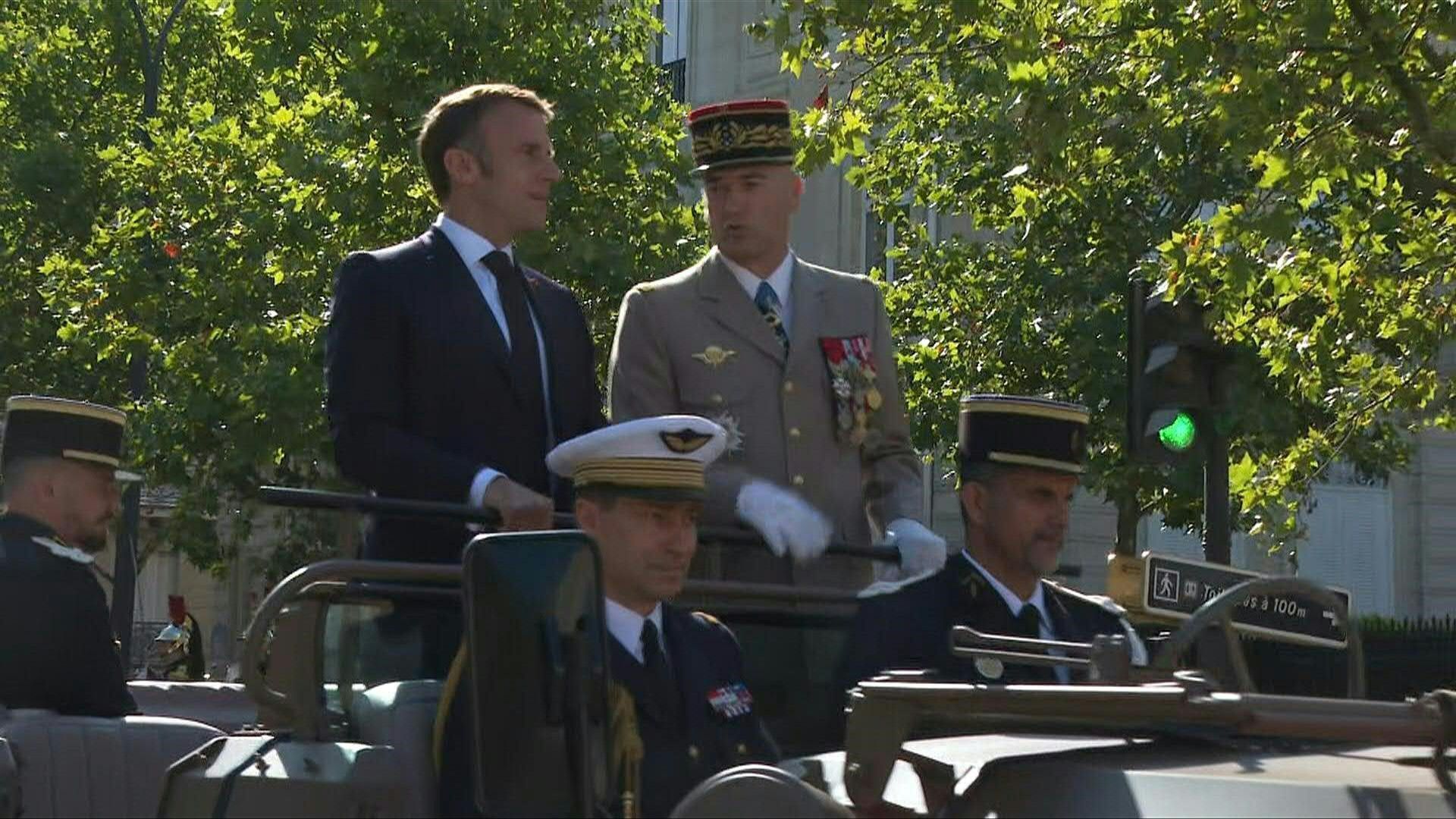 French President Macron boards 'command car' for military parade