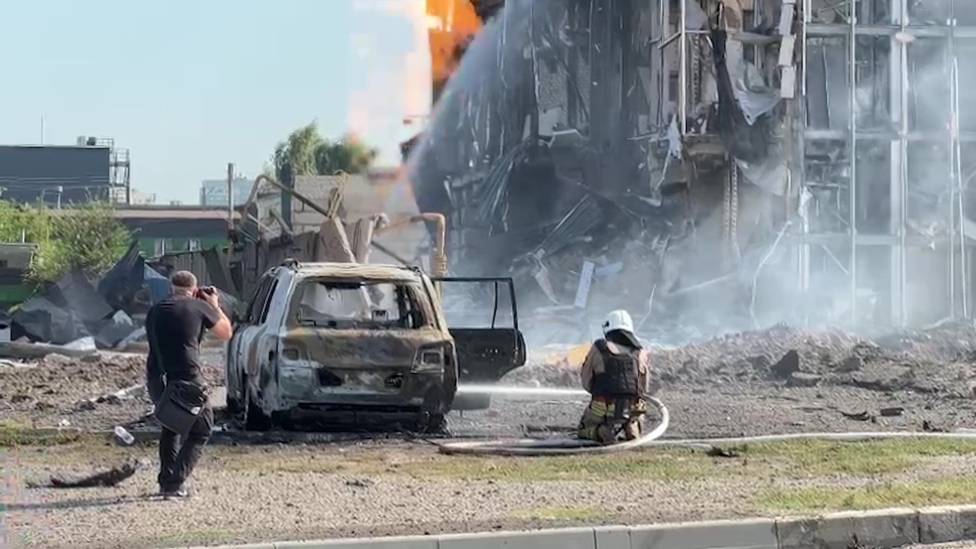Firefighters on the scene after Russian strike on Ukraine's Kharkiv