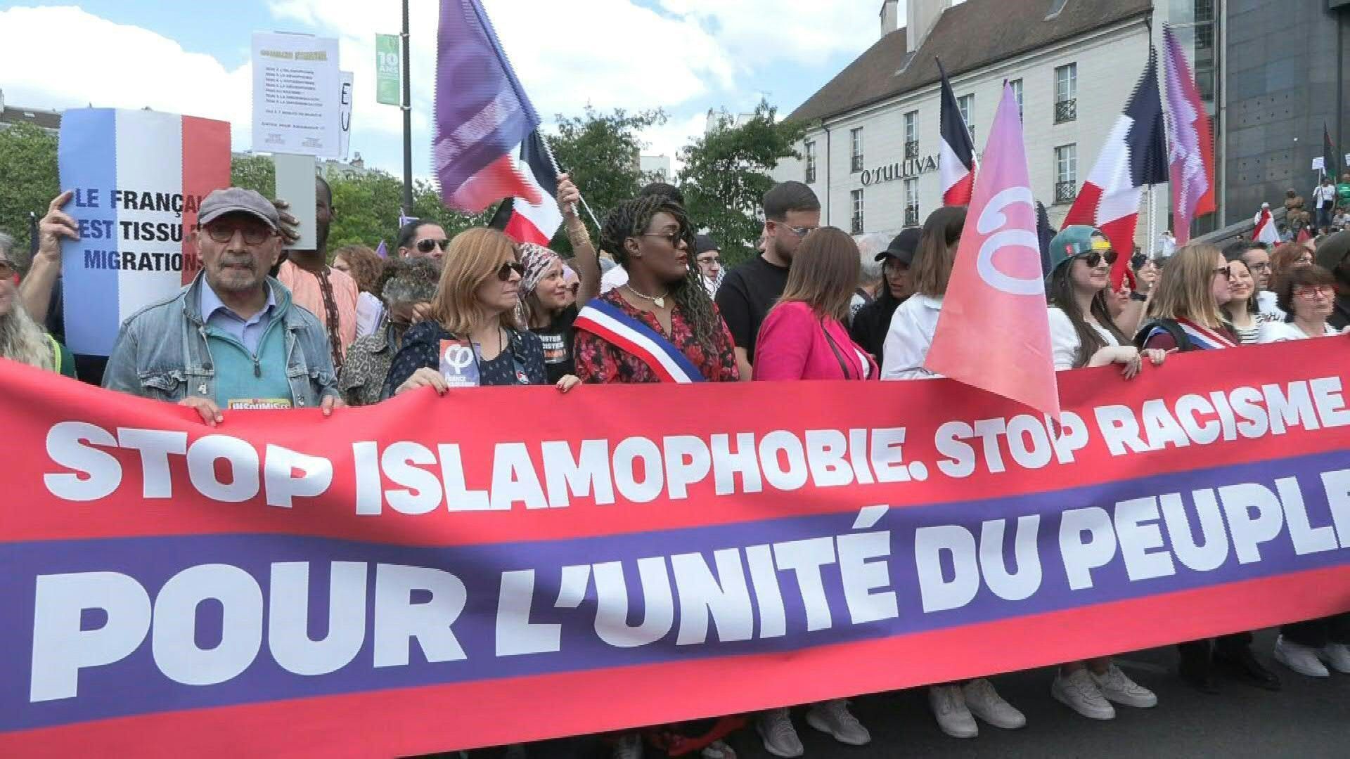 Thousands march in Paris against Islamophobia after mosque killing