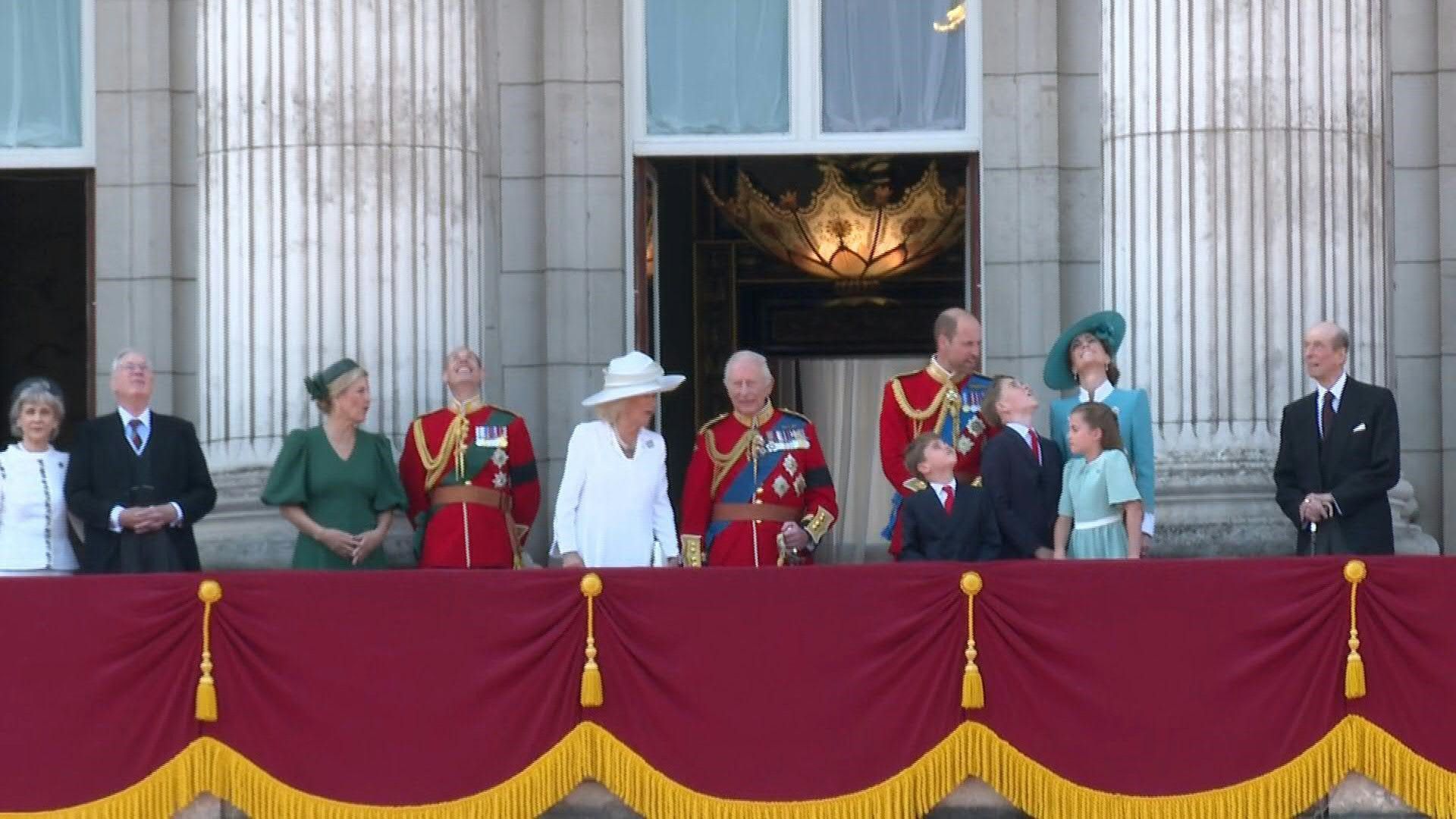 Britain's royal family watch Red Arrows flypast from Buckingham Palace