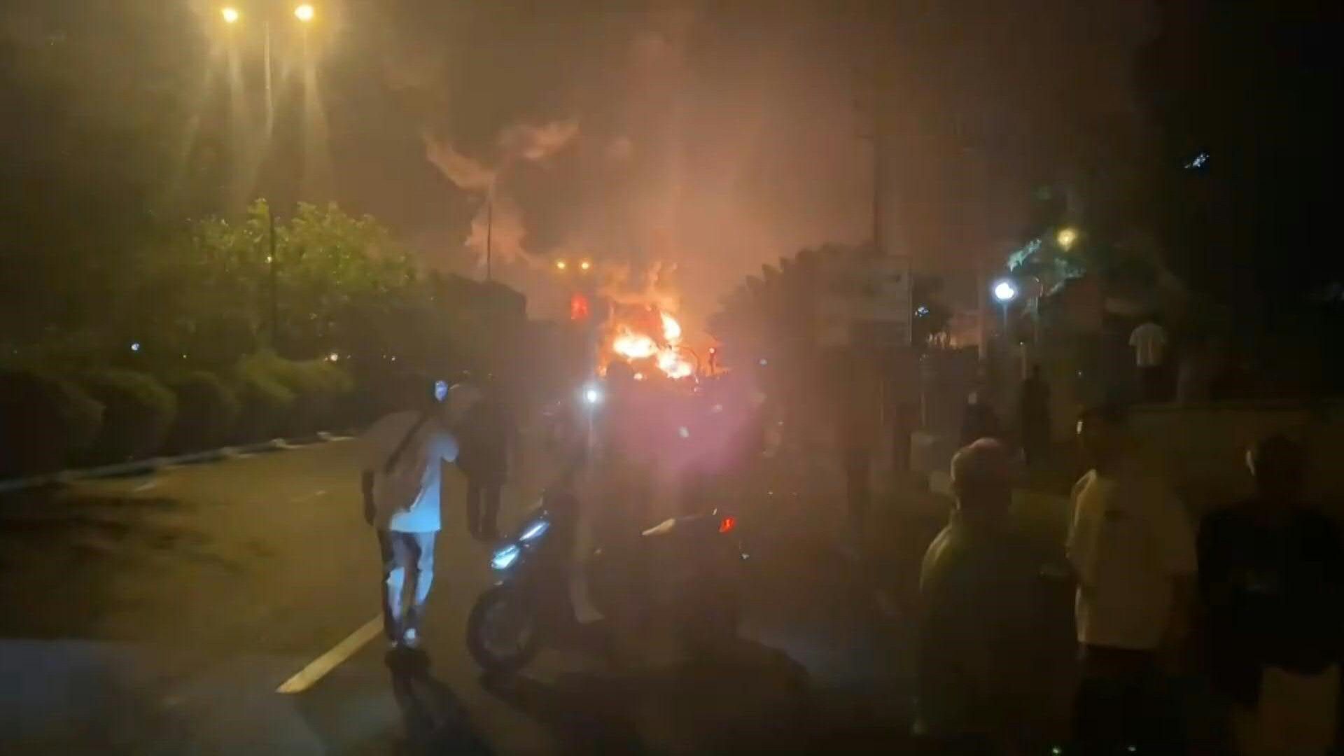 Flames blaze from Tehran oil depots hit by Israeli strike