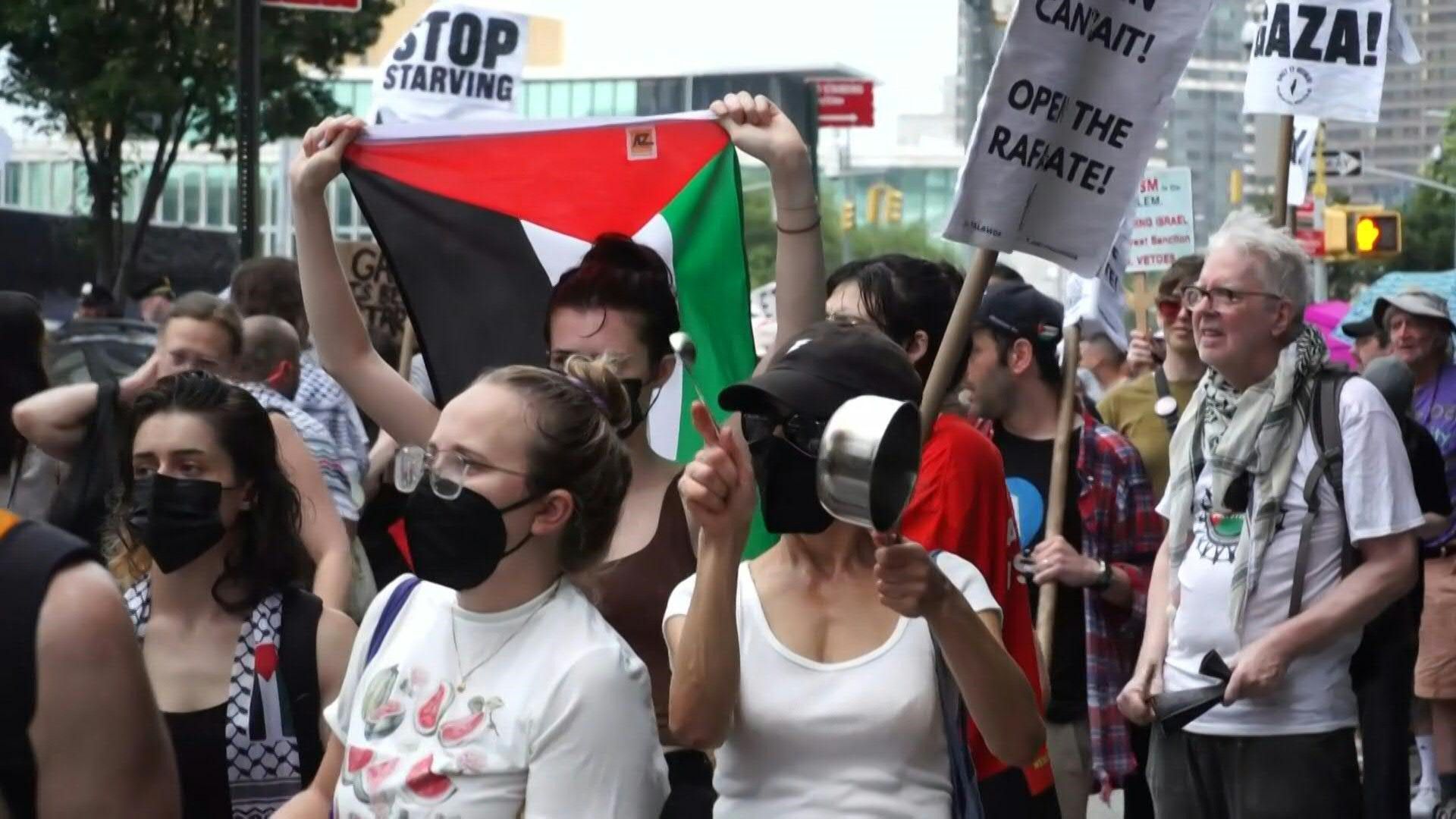 Pro-Palestinian protesters gather outside the UN amid starvation in Gaza