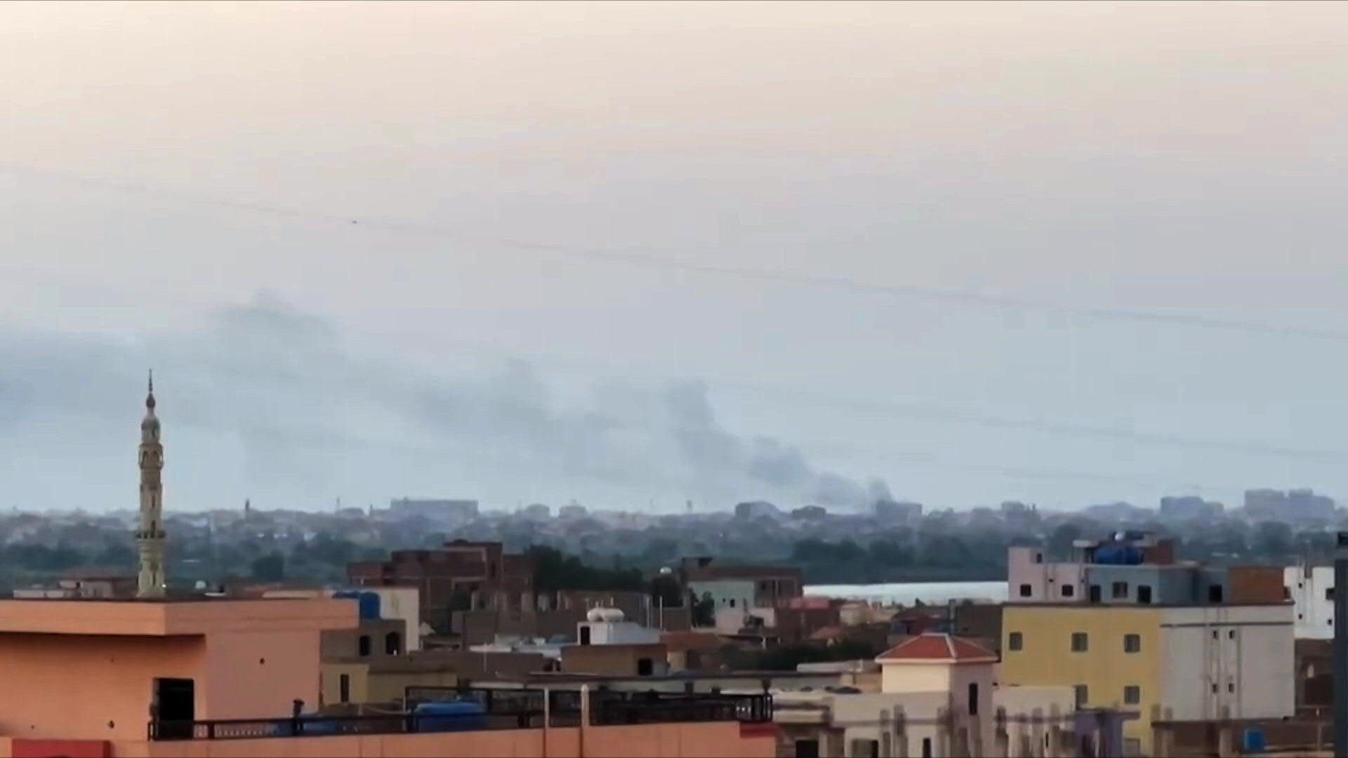 Smoke billows after a drone attack near Khartoum airport area ahead of reopening