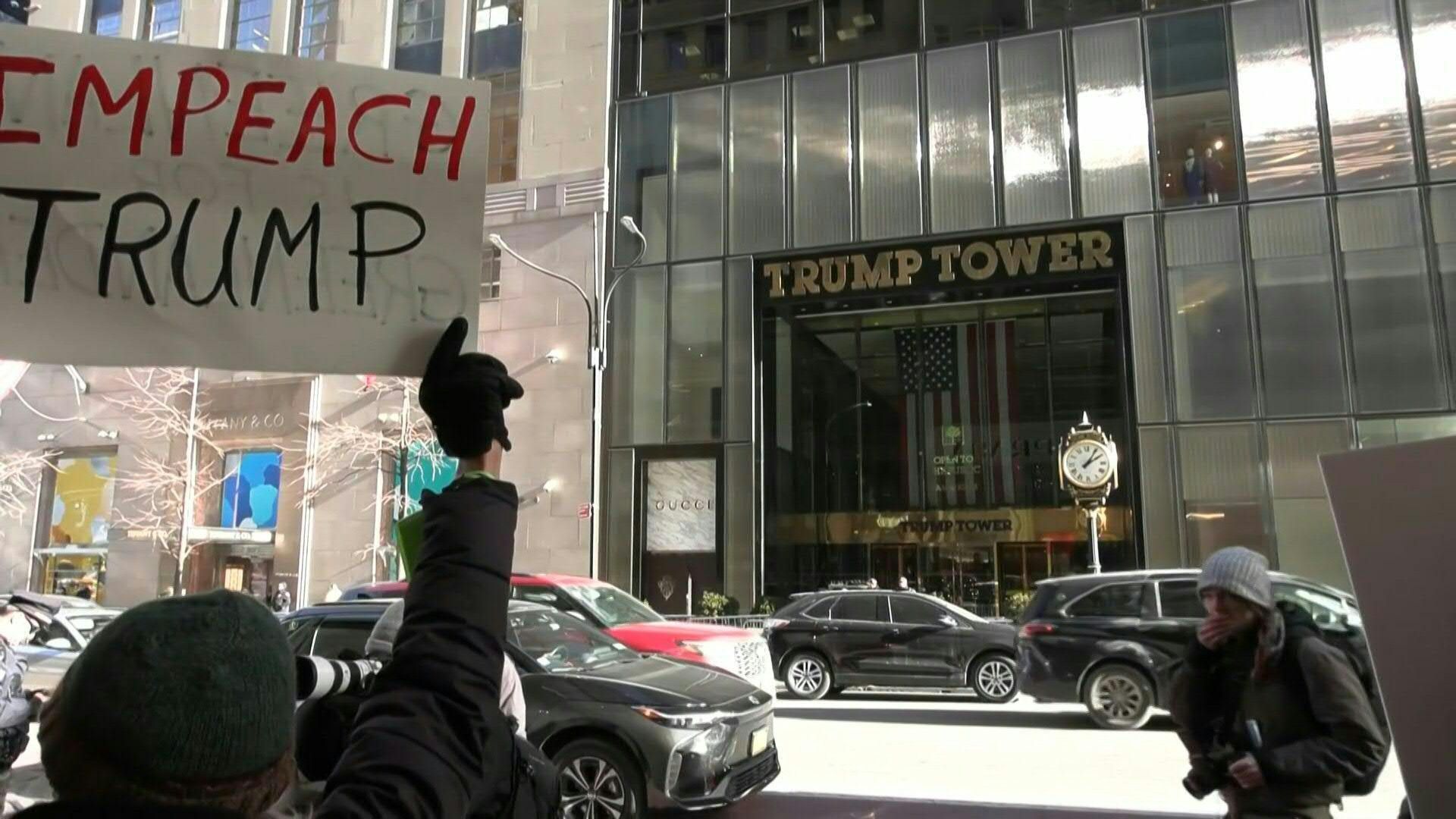 Video: New Yorkers rally outside Trump Tower on second inauguration anniversary