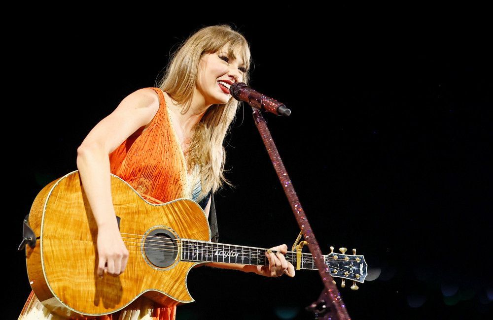Taylor Swift has explained the orange theme for her upcoming album The Life of a Showgirl