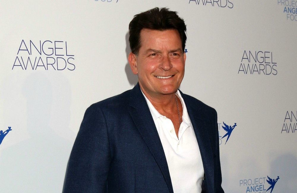 Charlie Sheen reveals that Bill Clinton tried to hit on his girlfriend