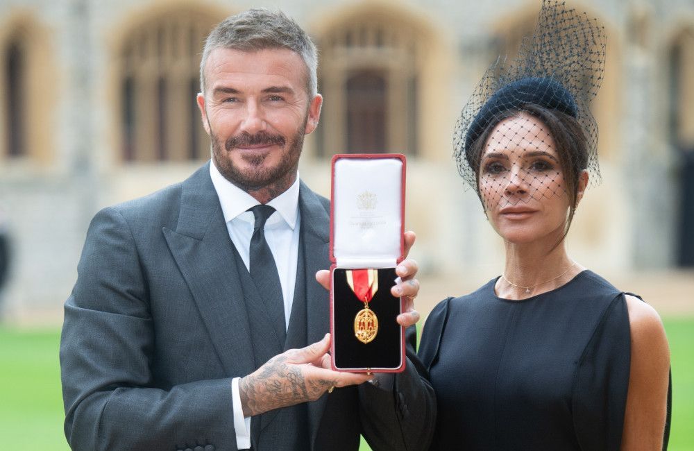 Sir David Beckham admits he shed 'a few tears' as he received his knighthood