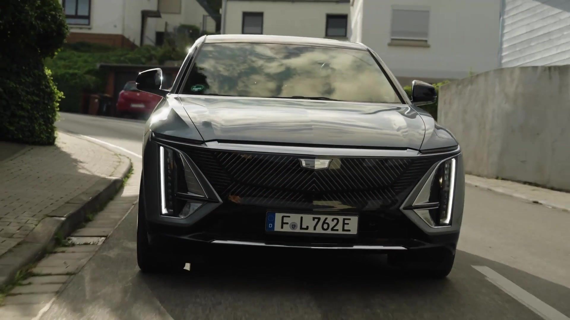 Cadillac LYRIQ in Grey Driving Video