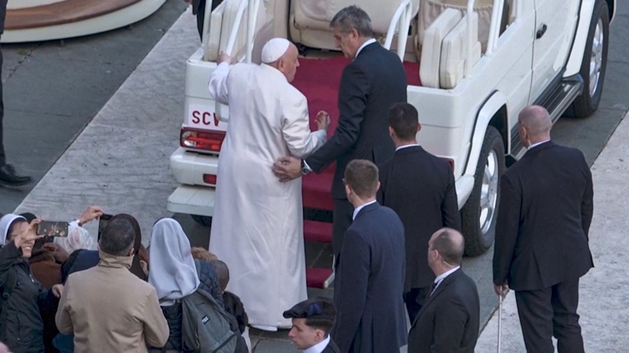 Moment of weakness during general audience: Pope struggles to board Popemobile
