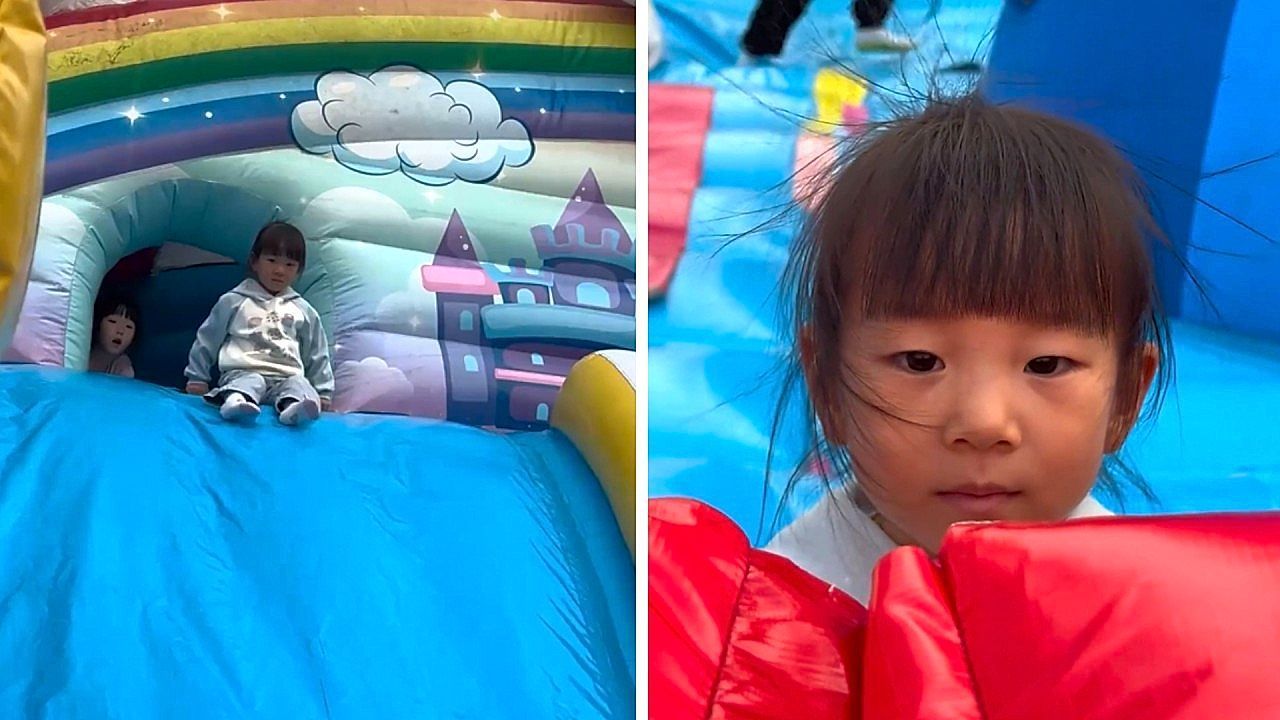 Girl's hair stands on end from static electricity after sliding down inflatable
