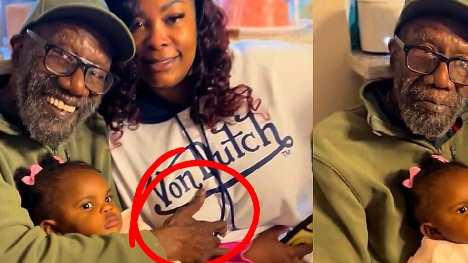 Family photo turns awkward after dad mistakes daughter's boob for baby's head