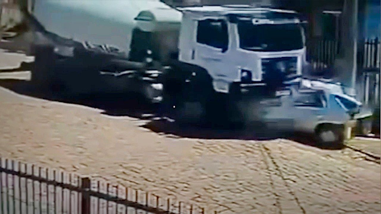 Video: Runaway cement mixer flattens parked car in seconds