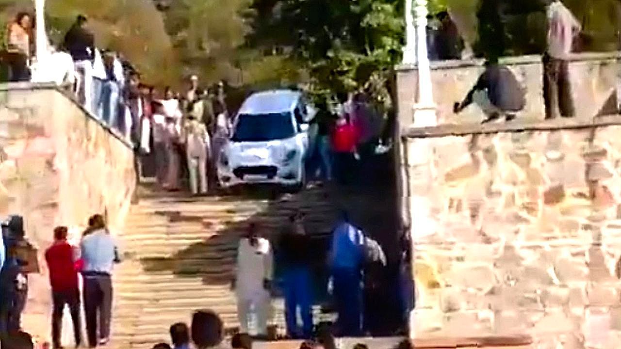 Video: Navigation error sends family car onto temple stairs in India