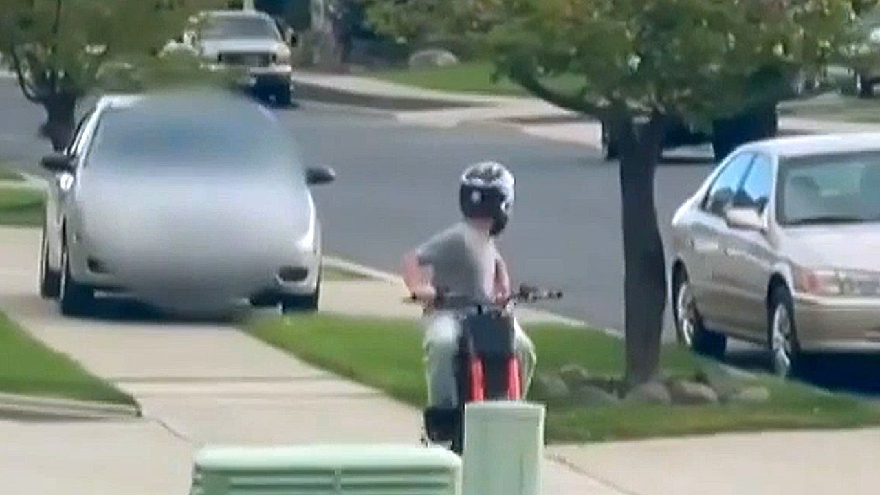 Video: Washington woman arrested after hopping curb to try to run over child on dirt bike