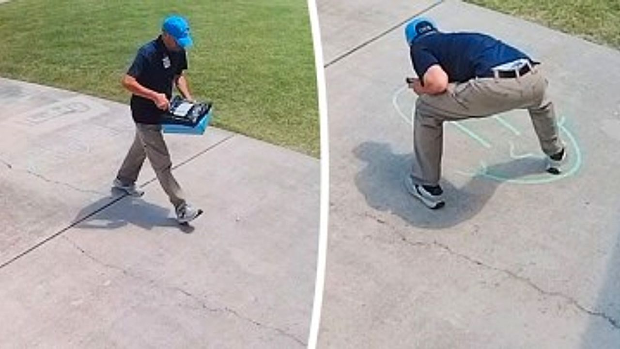 Video: Mailman stops mid-route to add smiley face to child's chalk drawing
