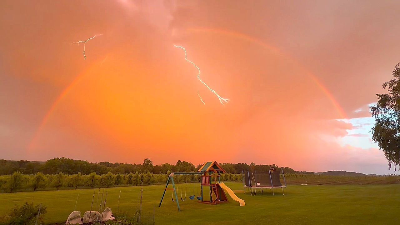 Video: New Yorkers capture moment lightning arcs through rainbow