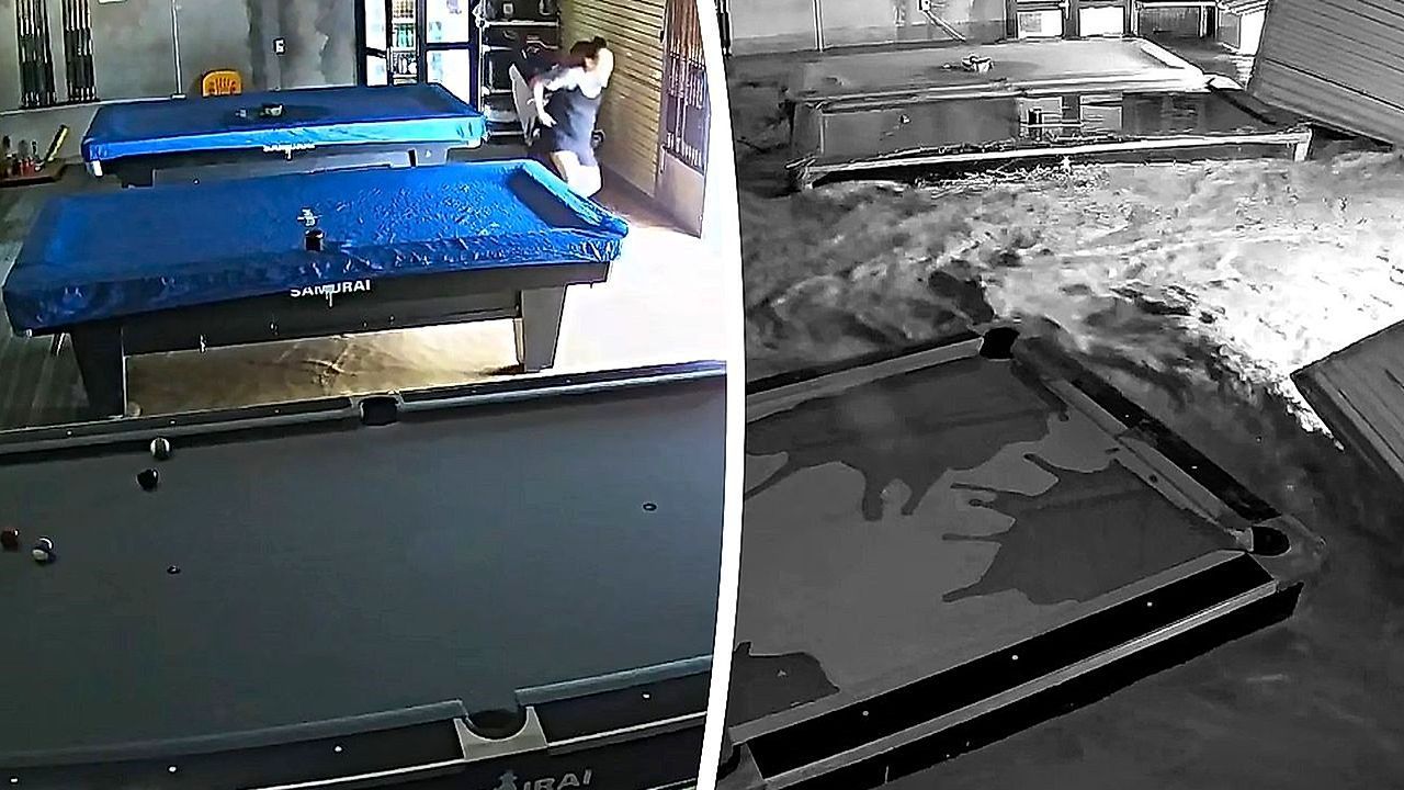 Video: Unaufhaltsame Wassermassen: Sturzflut verwüstet Billardsalon in Vietnam
