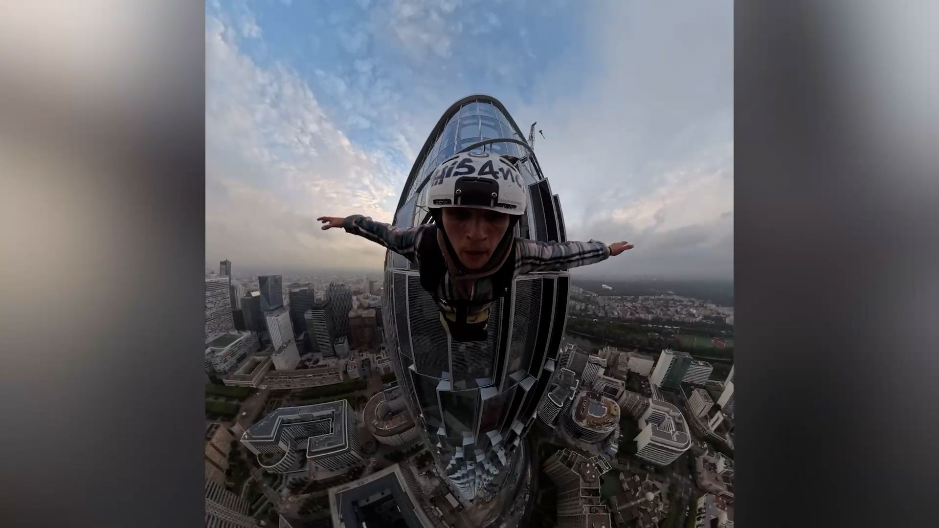 Daring Brit sneaks into France's tallest skyscraper and parachutes from 845 feet high